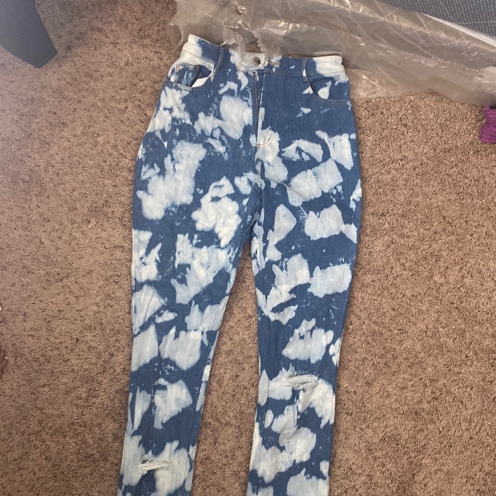 Blue and white bleach print stacked jeans